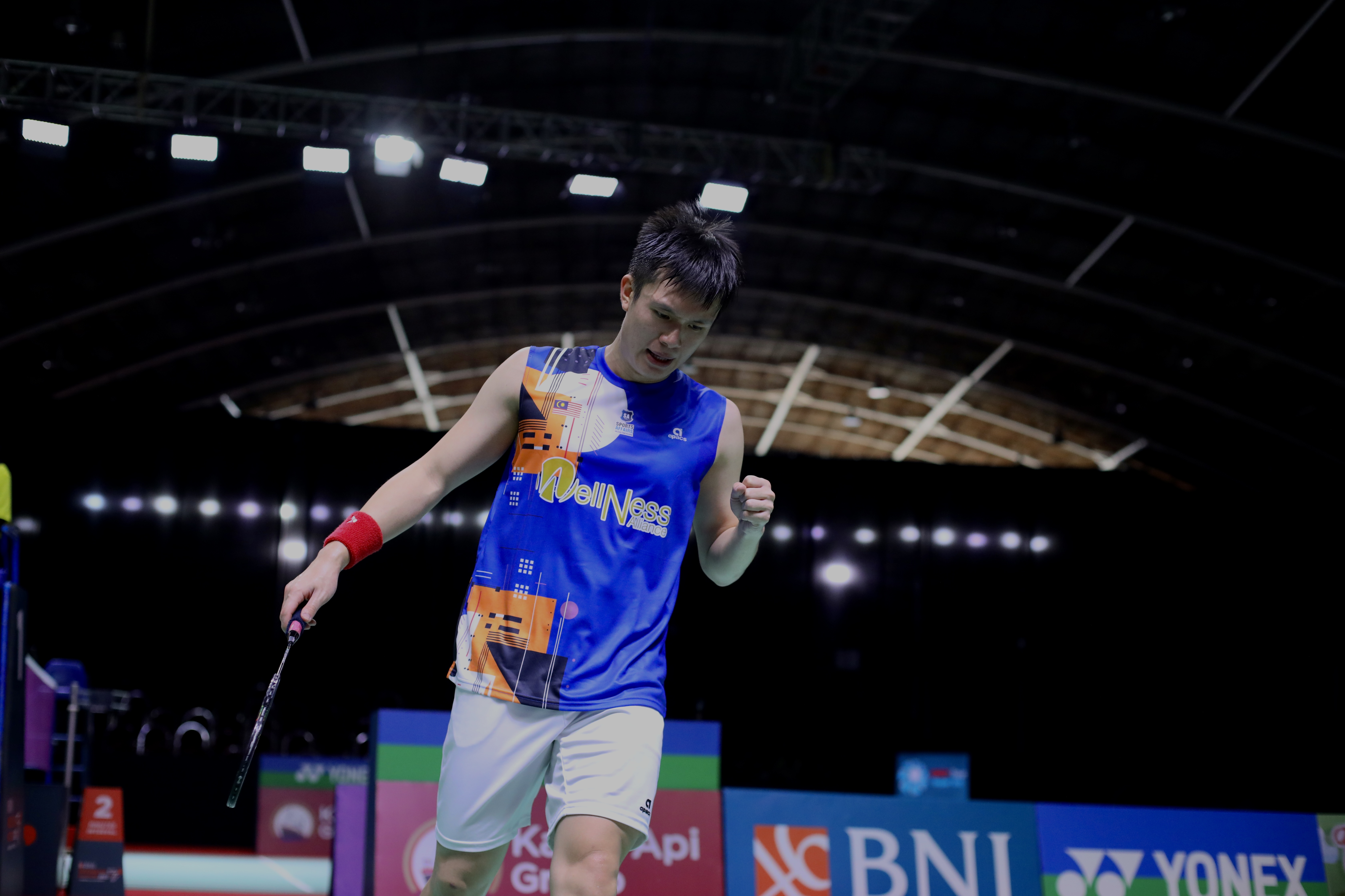 Sean Ngu celebrating during a badminton tournament