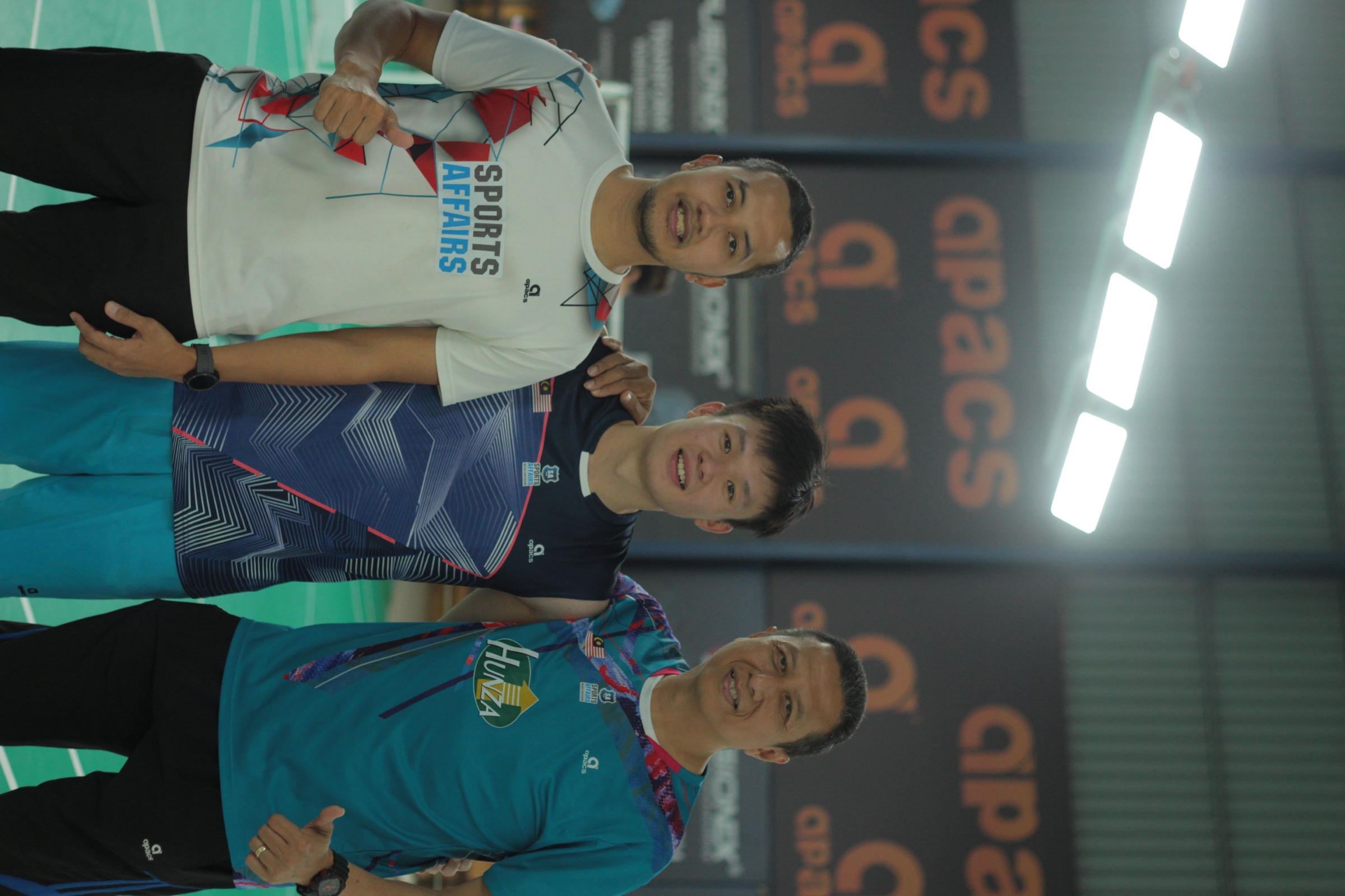Sean Ngu with Sports Affairs coaches during his international stage